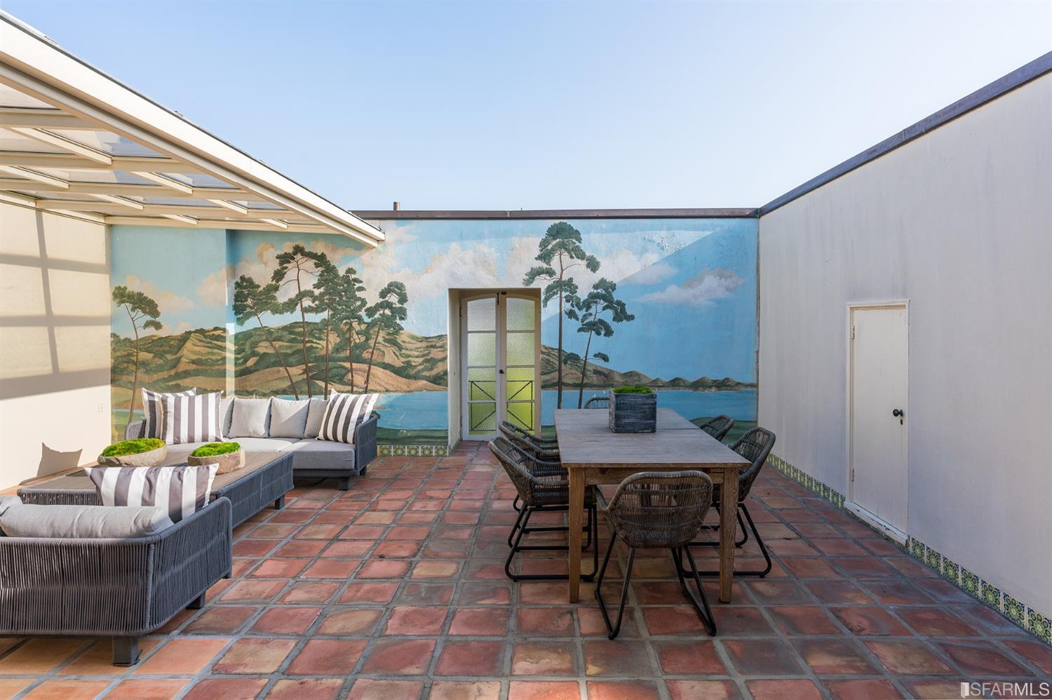 3498 Jackson Street San Francisco, CA 94118 - Photo 32 of 38 a dining room with furniture and glass door