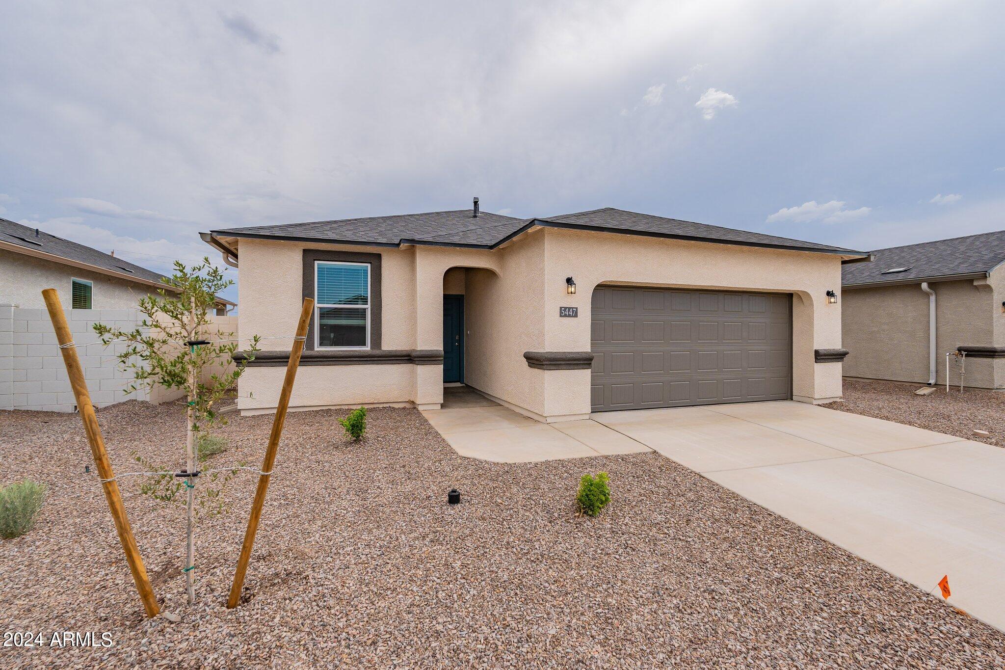 5447 Azara Drive San Tan Valley, AZ 85140 - Photo 1 of 21 a house with a outdoor space