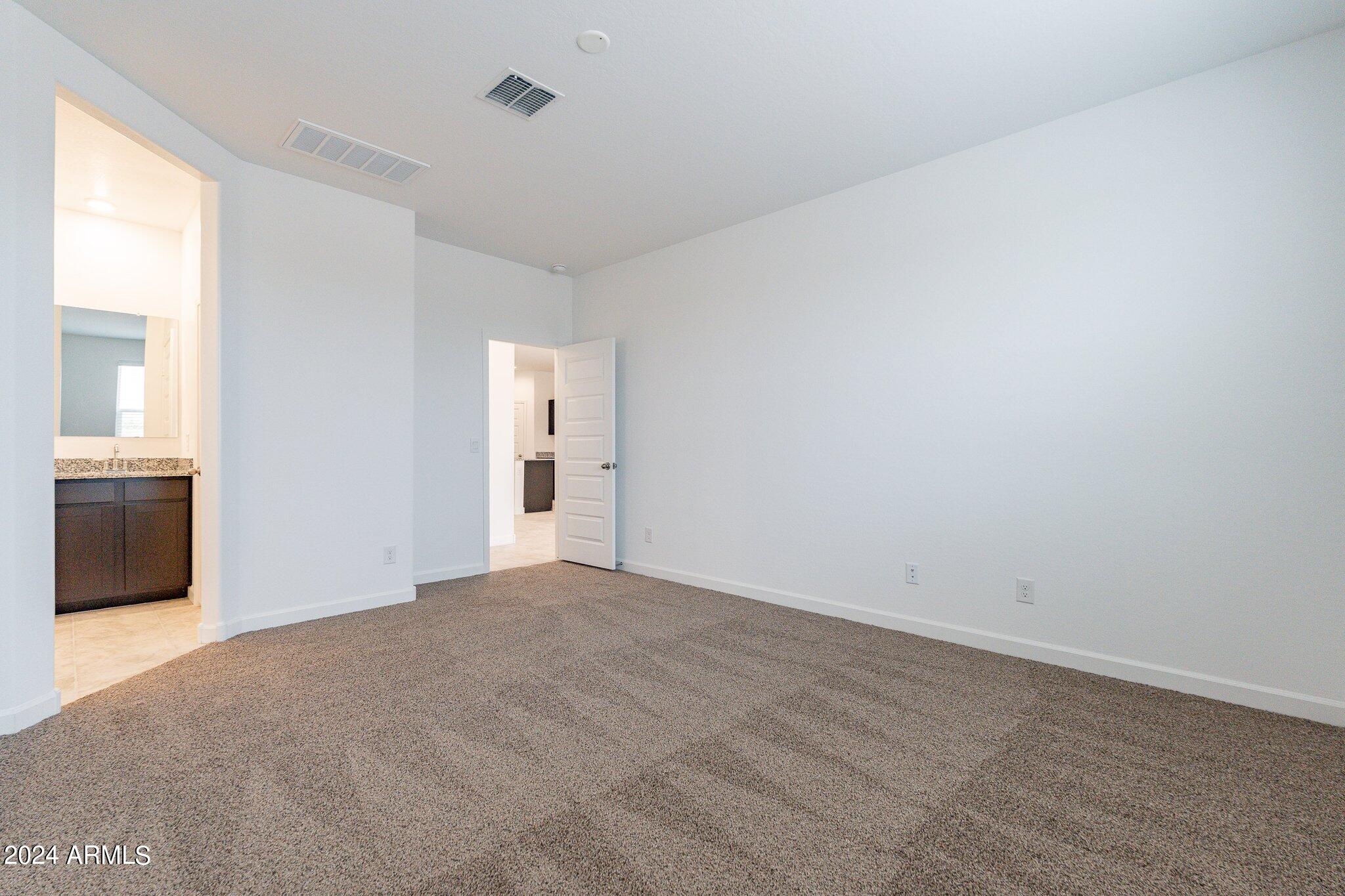 5447 Azara Drive San Tan Valley, AZ 85140 - Photo 11 of 21 a view of an empty room with a window