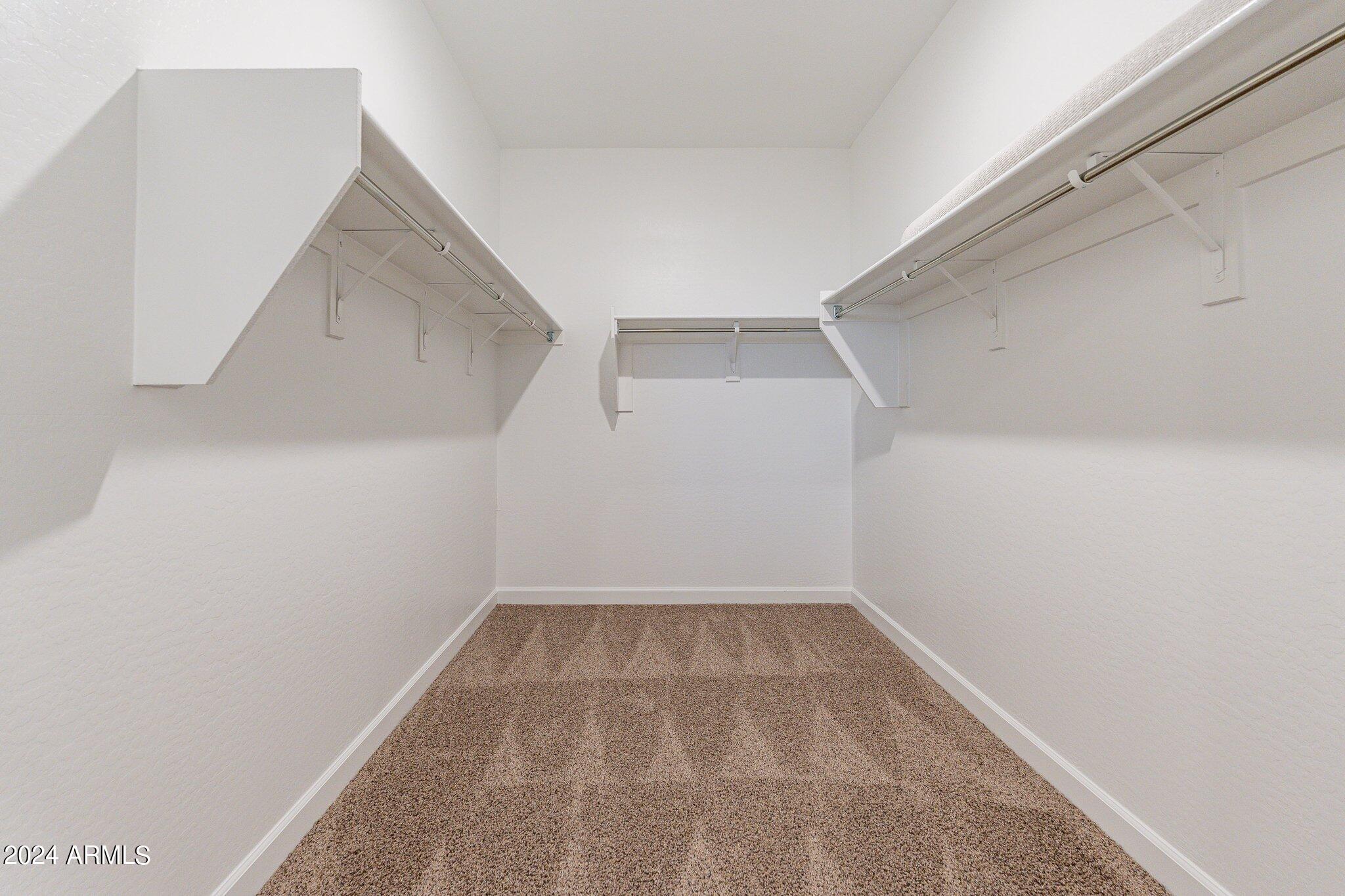 5447 Azara Drive San Tan Valley, AZ 85140 - Photo 14 of 21 a view of a room with shelf