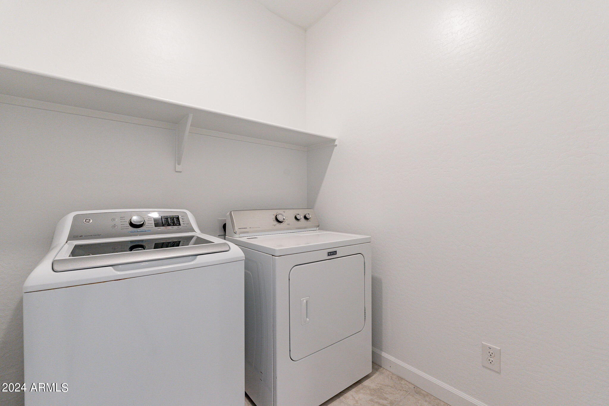 5447 Azara Drive San Tan Valley, AZ 85140 - Photo 19 of 21 a utility room with dryer and washer