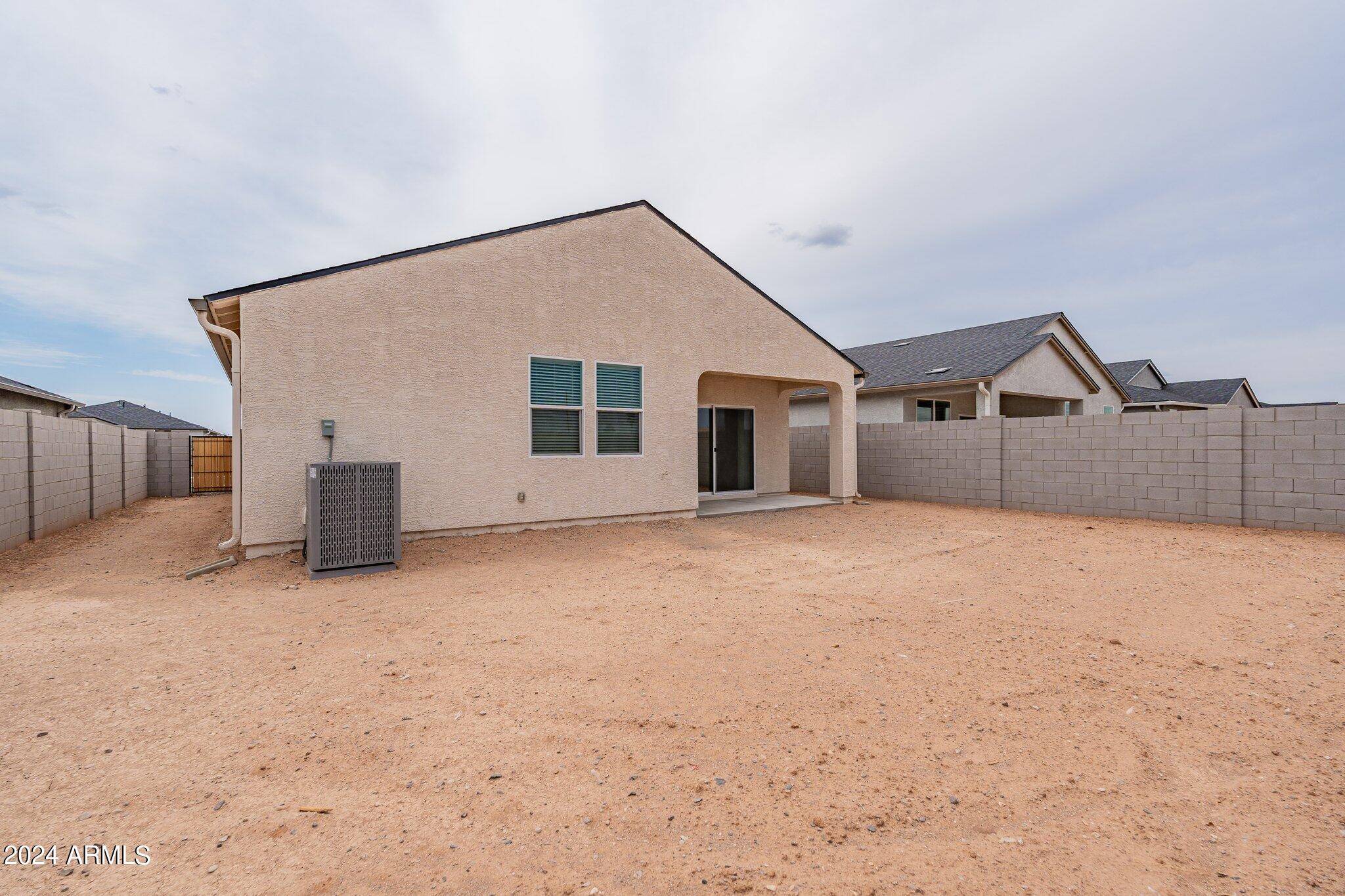 5447 Azara Drive San Tan Valley, AZ 85140 - Photo 21 of 21 a view of a house with a snow in yard