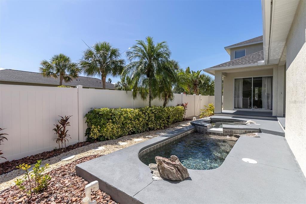10121 Porch Street New Port Richey, FL 34655 - Photo 42 of 57 a view of a house with backyard and sitting area