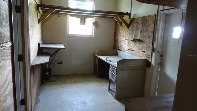 a room with storage and utility