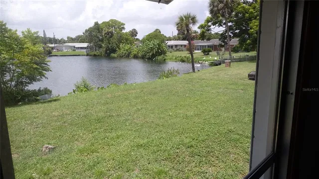 a view of a lake from a window
