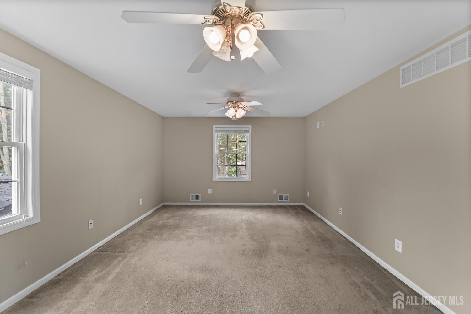 169 Docare Road Jackson, NJ 08527 - Photo 14 of 21 a view of an empty room with a window