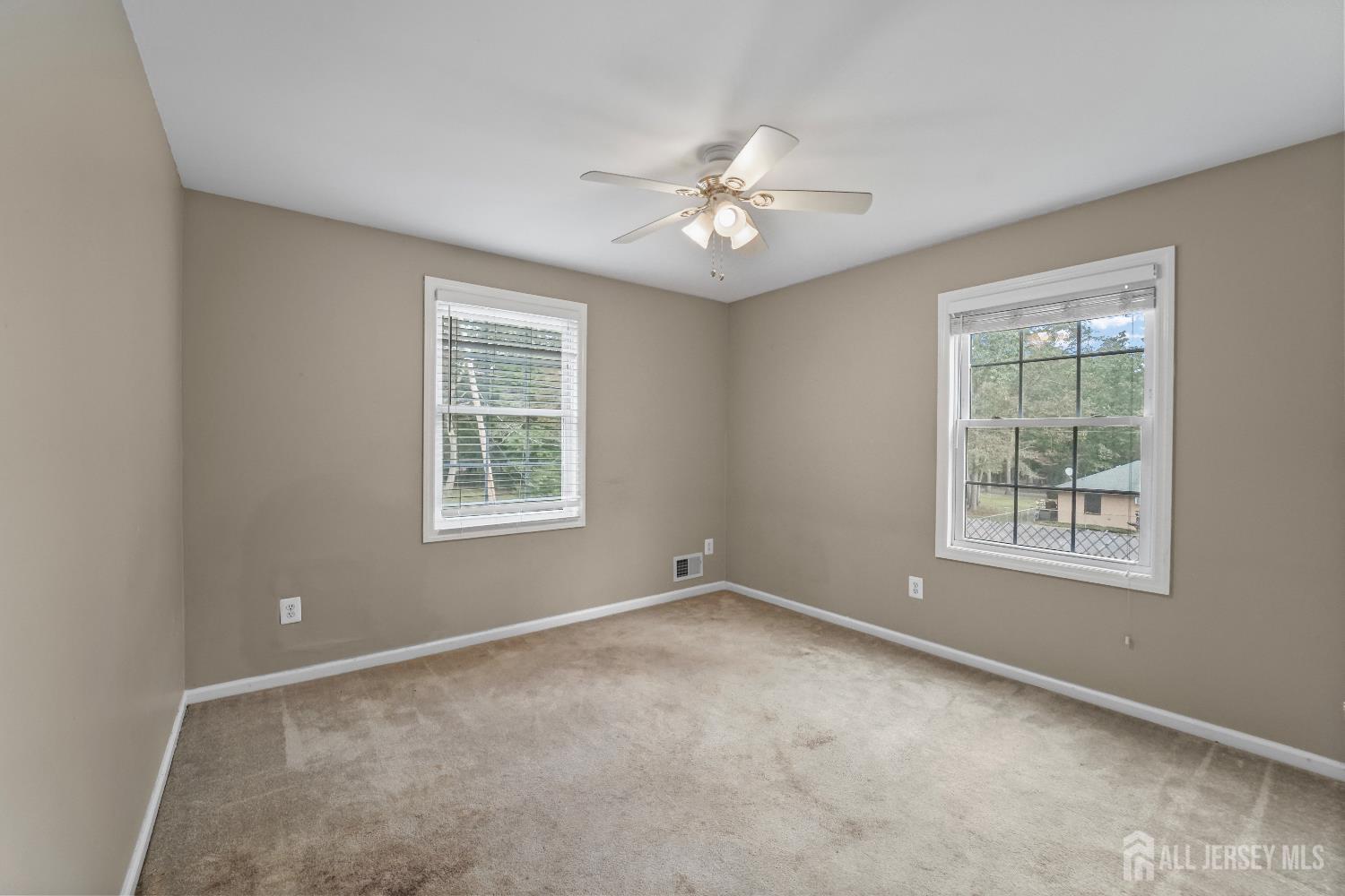 169 Docare Road Jackson, NJ 08527 - Photo 17 of 21 a view of an empty room with a window