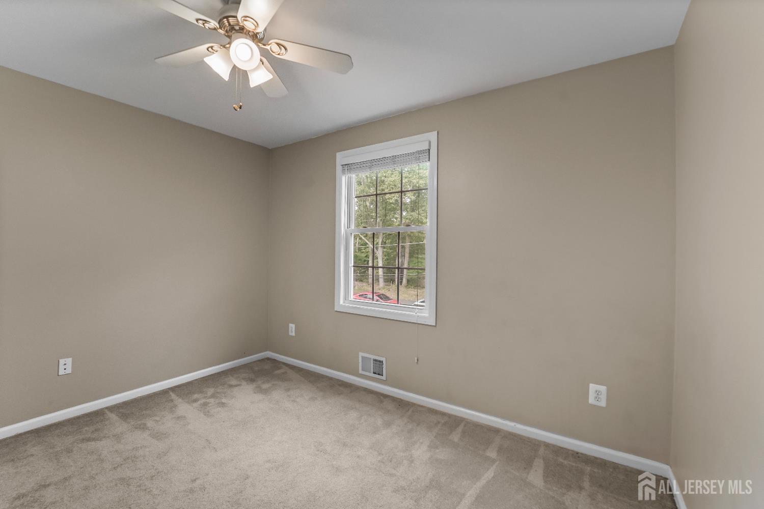 169 Docare Road Jackson, NJ 08527 - Photo 20 of 21 a view of an empty room with a window