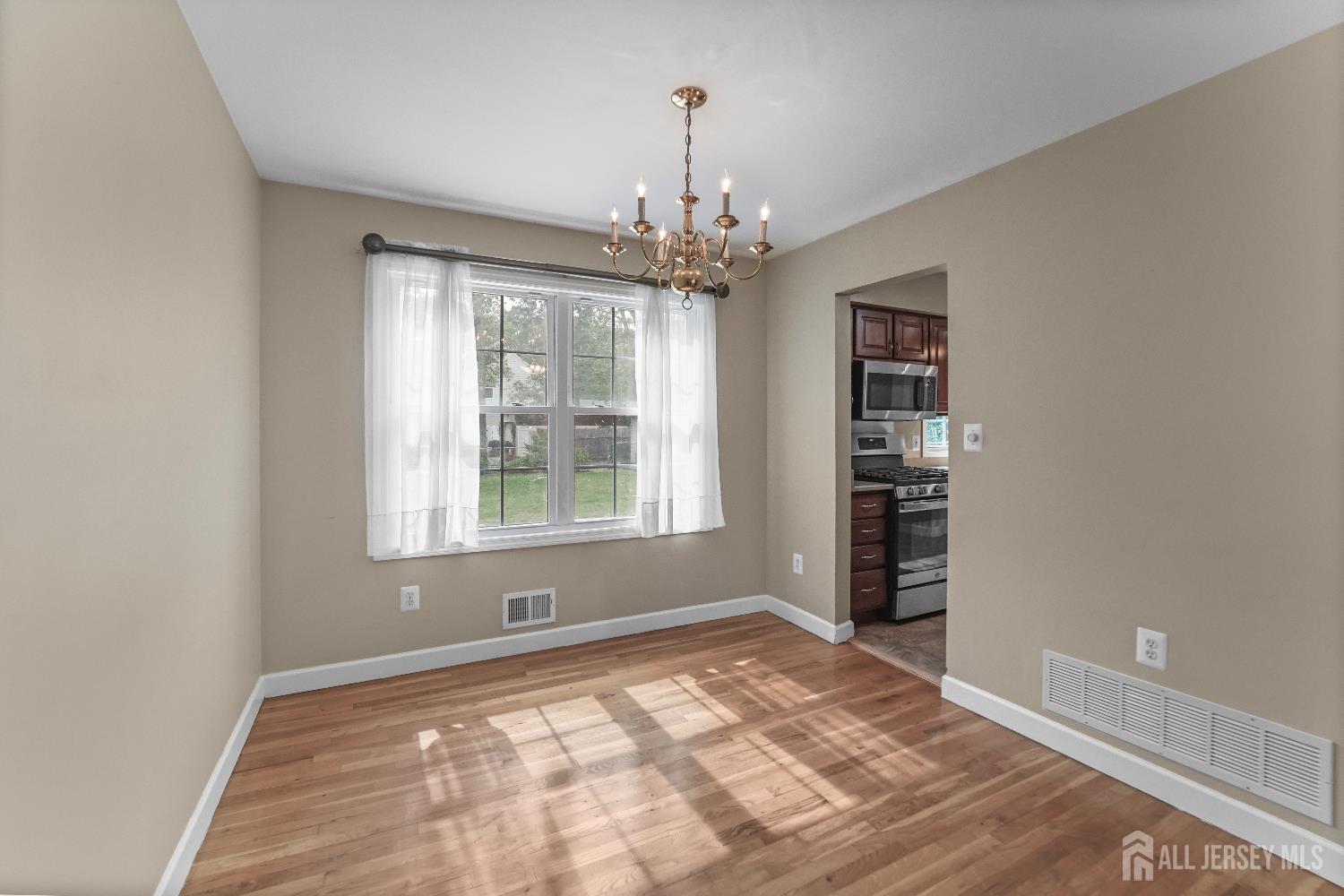 169 Docare Road Jackson, NJ 08527 - Photo 9 of 21 a view of an empty room with a window