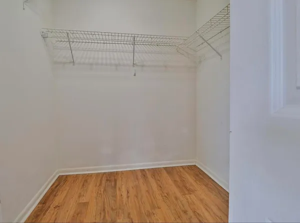 a view of a room with racks on the wall