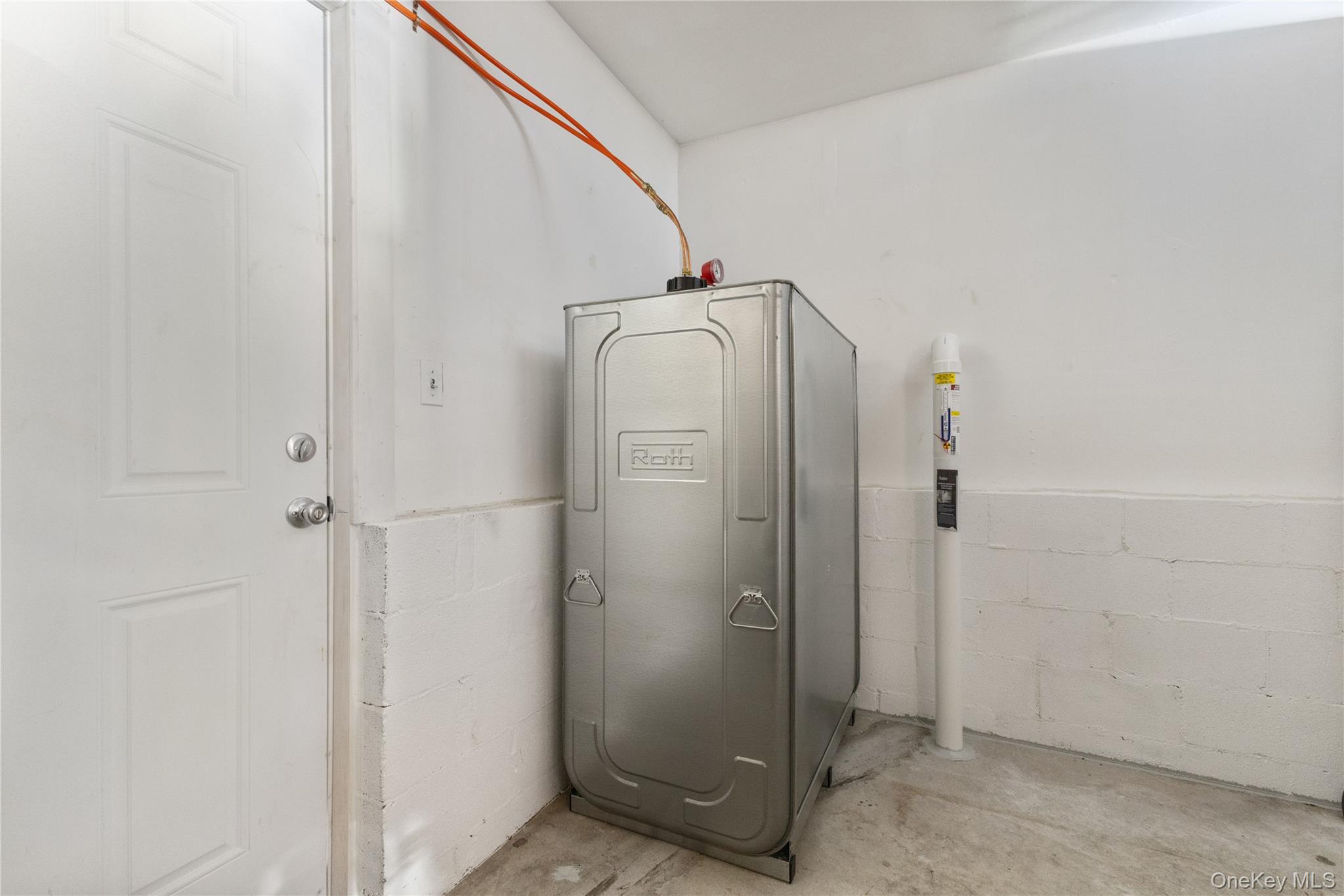 7 Cimarron Road Putnam Valley, NY 10579 - Photo 44 of 50 Garage storage area with brand new Roth oil tank and oil burner system.