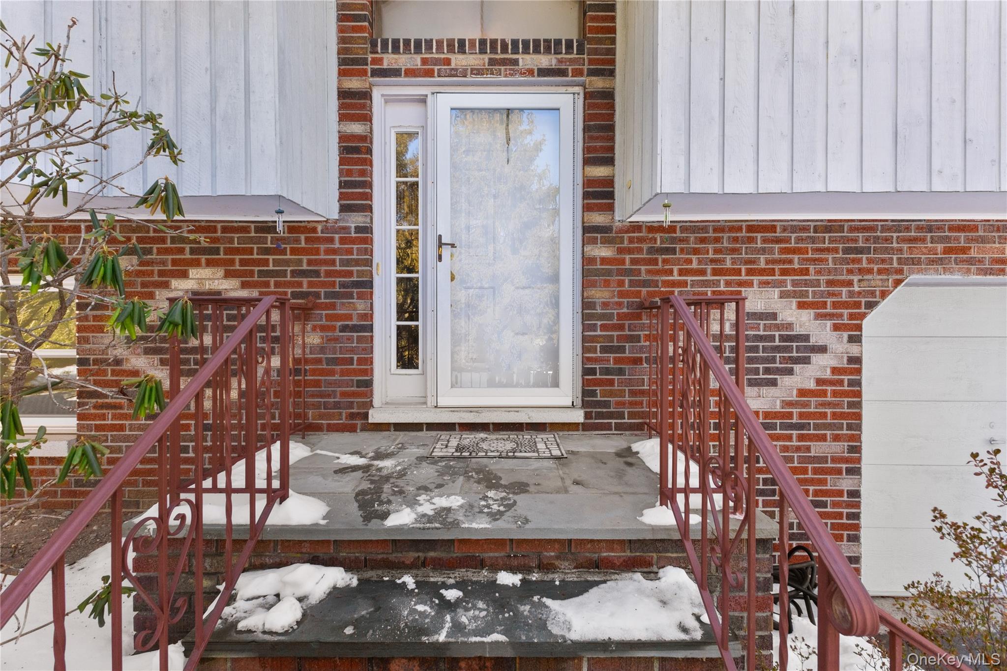 7 Cimarron Road Putnam Valley, NY 10579 - Photo 6 of 50 Inviting front entry with brick detailing and covered porch.