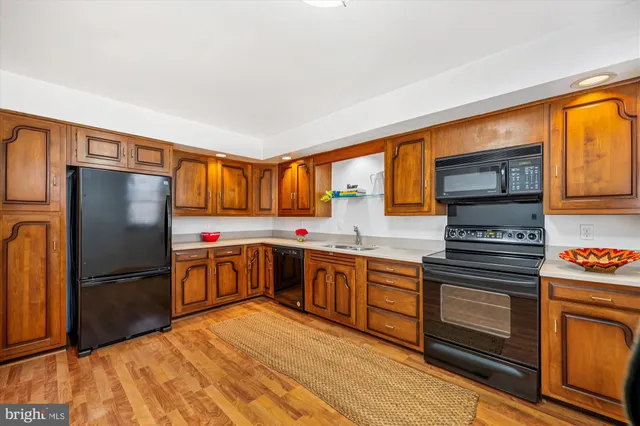 a bathroom with a sink and a shower
