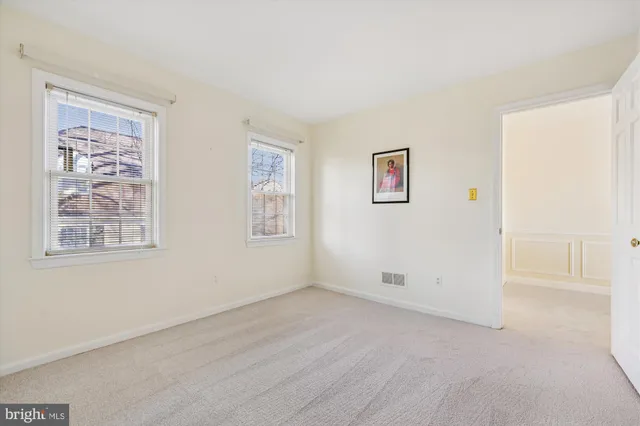 a front view of a building with street view