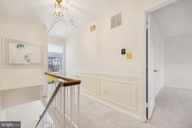 a front view of a house with a yard garage and outdoor seating