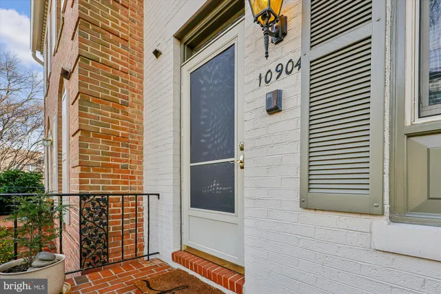 a bedroom with furniture and wooden floor