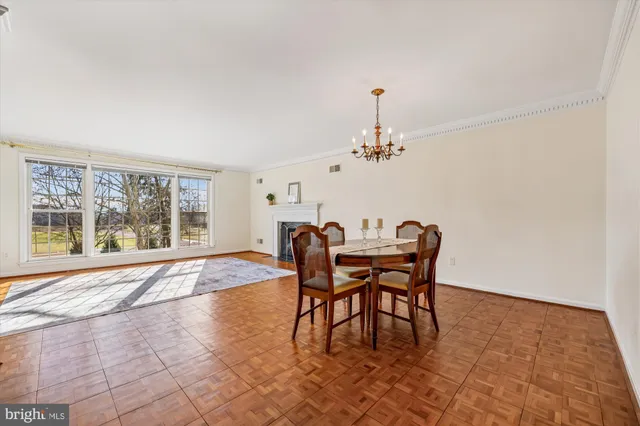 a bathroom with a granite countertop toilet and a shower