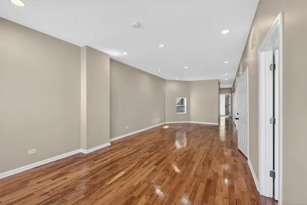 a view of livingroom with hardwood floor and a ceiling fan