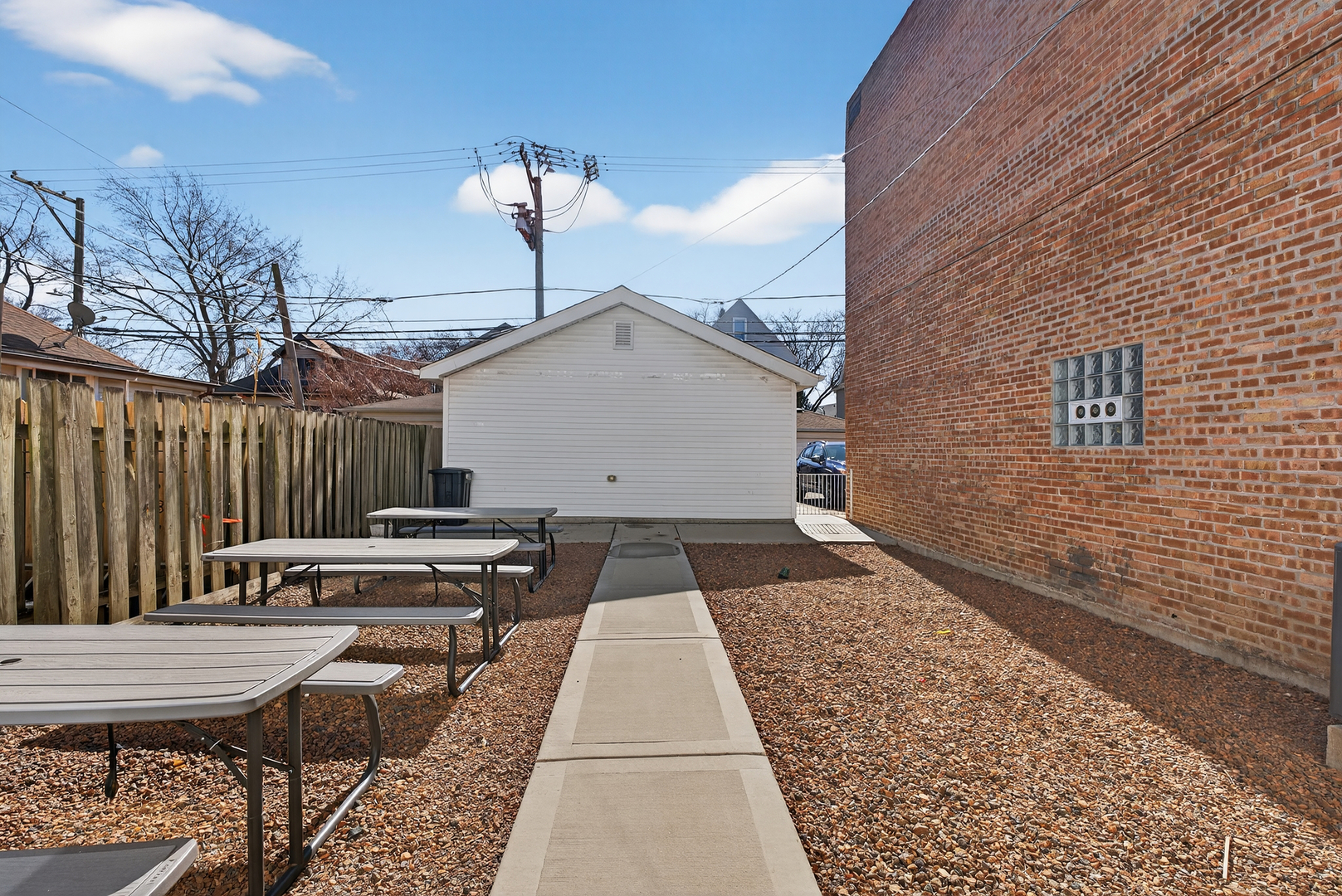 5709 West Irving Park Road, Unit 2 Chicago, IL 60634 - Photo 7 of 8 a front view of a house with a yard