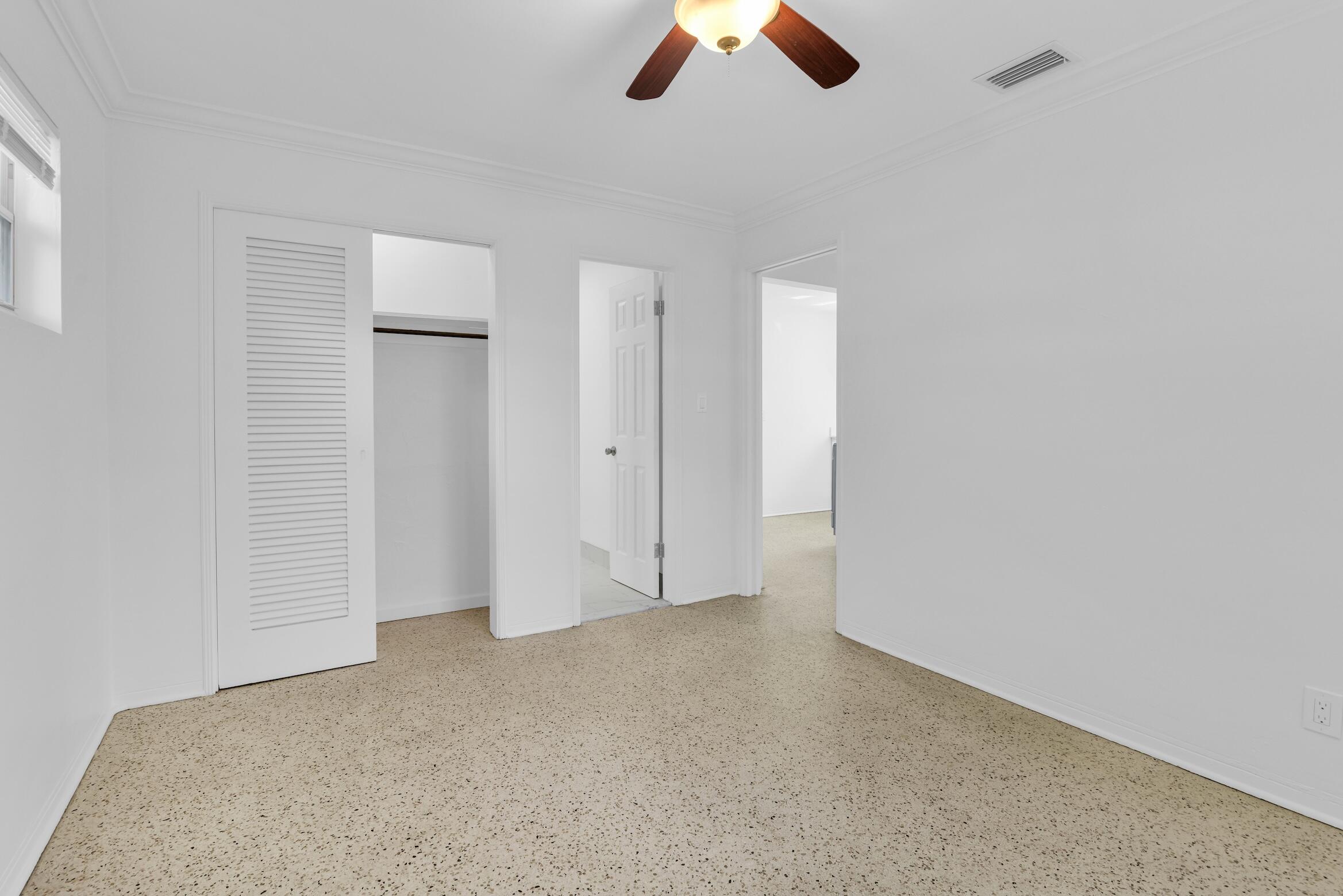 728 North L Street, Unit 2 Lake Worth Beach, FL 33460 - Photo 12 of 13 an empty room with ceiling fan