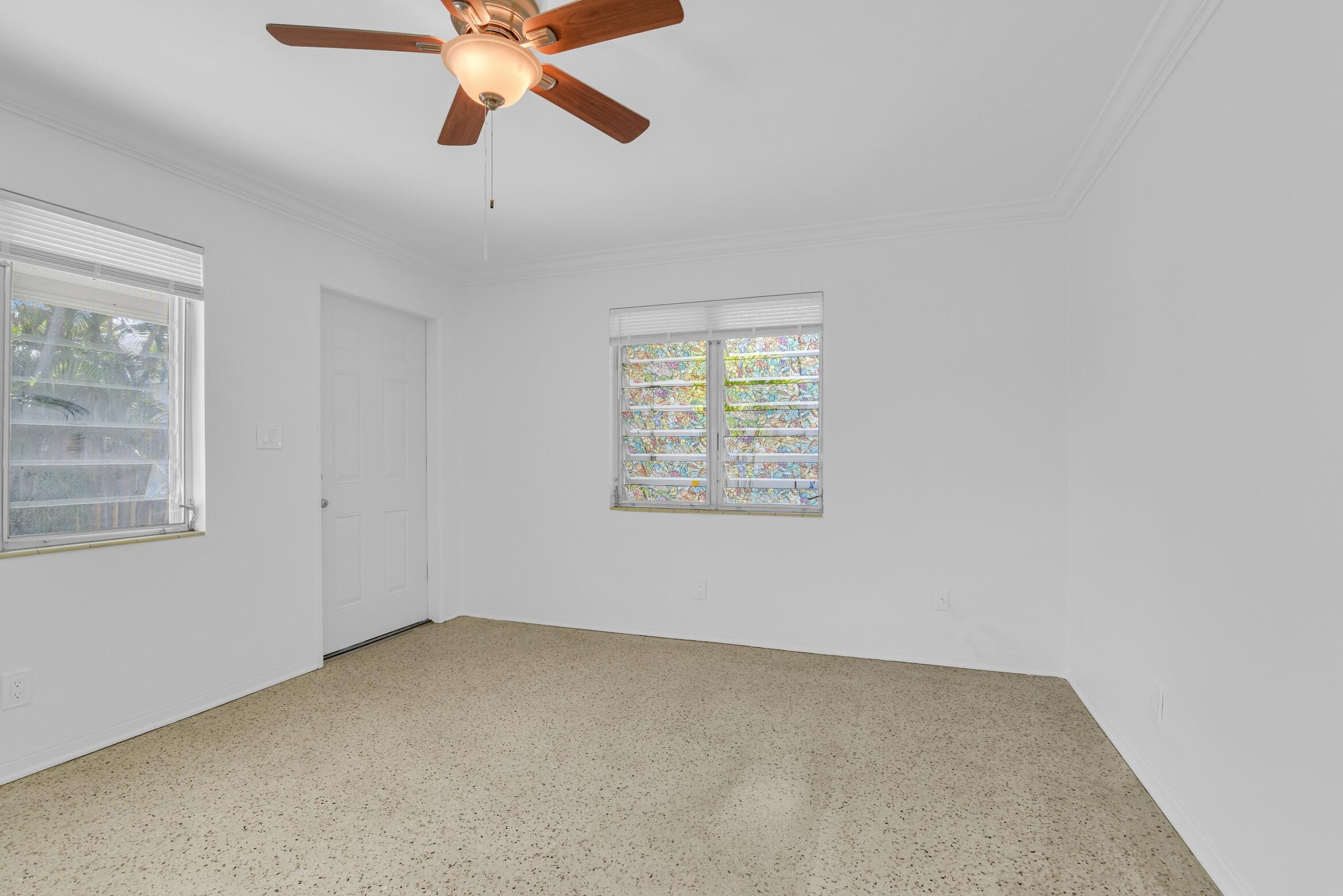 728 North L Street, Unit 2 Lake Worth Beach, FL 33460 - Photo 4 of 13 a view of an empty room with a window