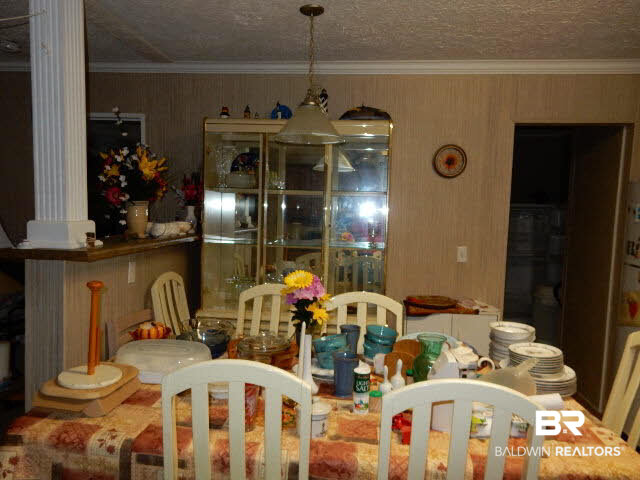 580 Escambia Loop Lillian, AL 36549 - Photo 5 of 16 Large eat in kitchen with room for full size table & hutch.
