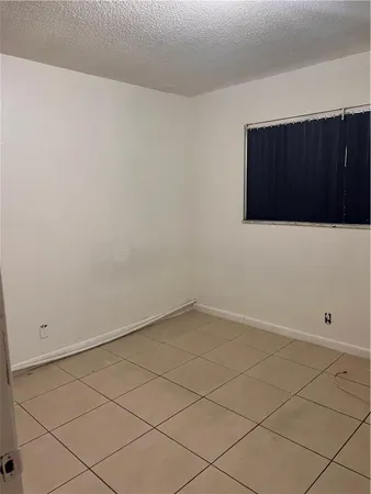 a view of a room with windows