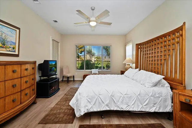 a front view of a house with a sitting area