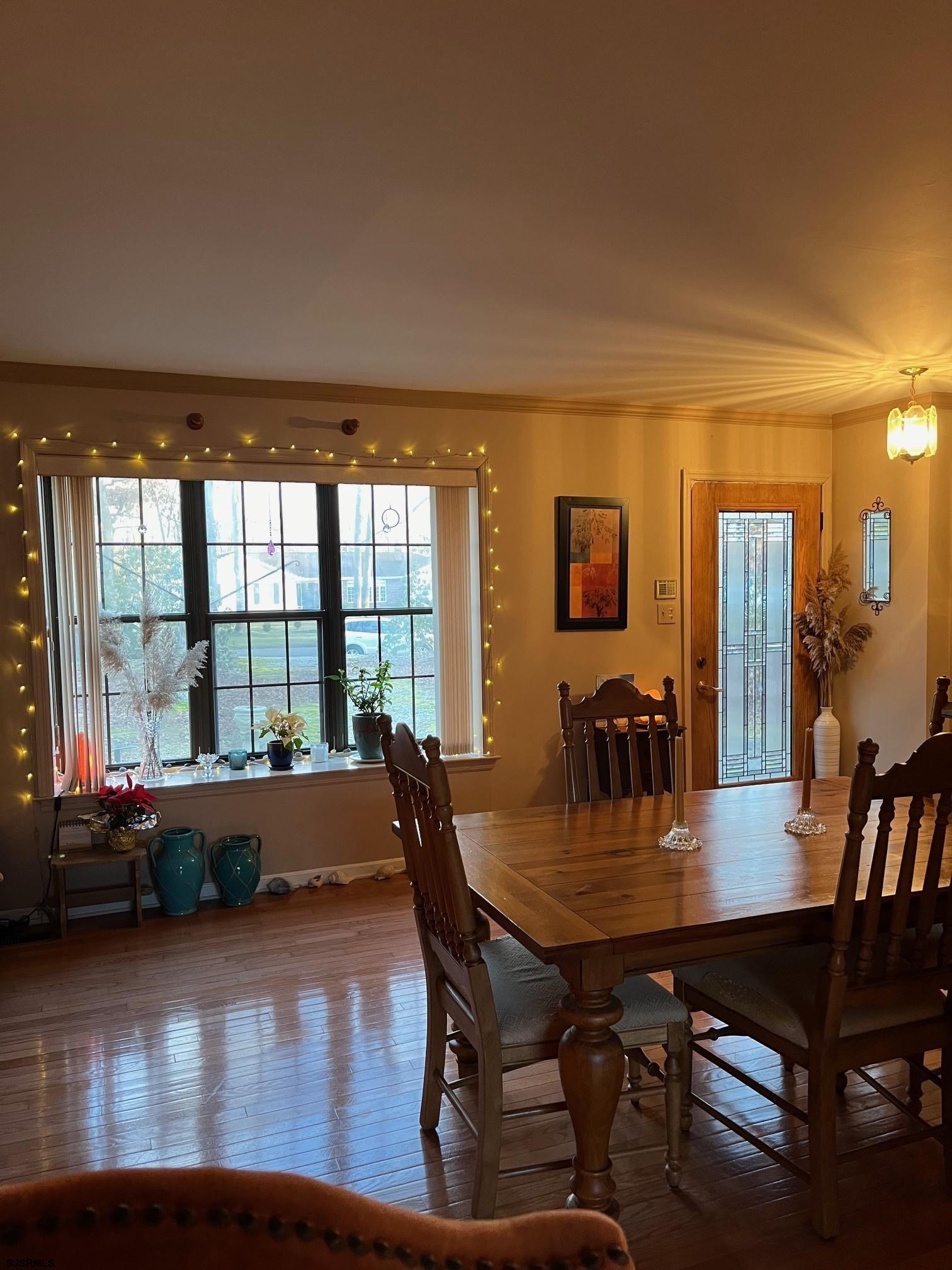 15 East Sunrise Road Woodbine, NJ 08270 - Photo 13 of 23 a view of a dining room with furniture and wooden floor
