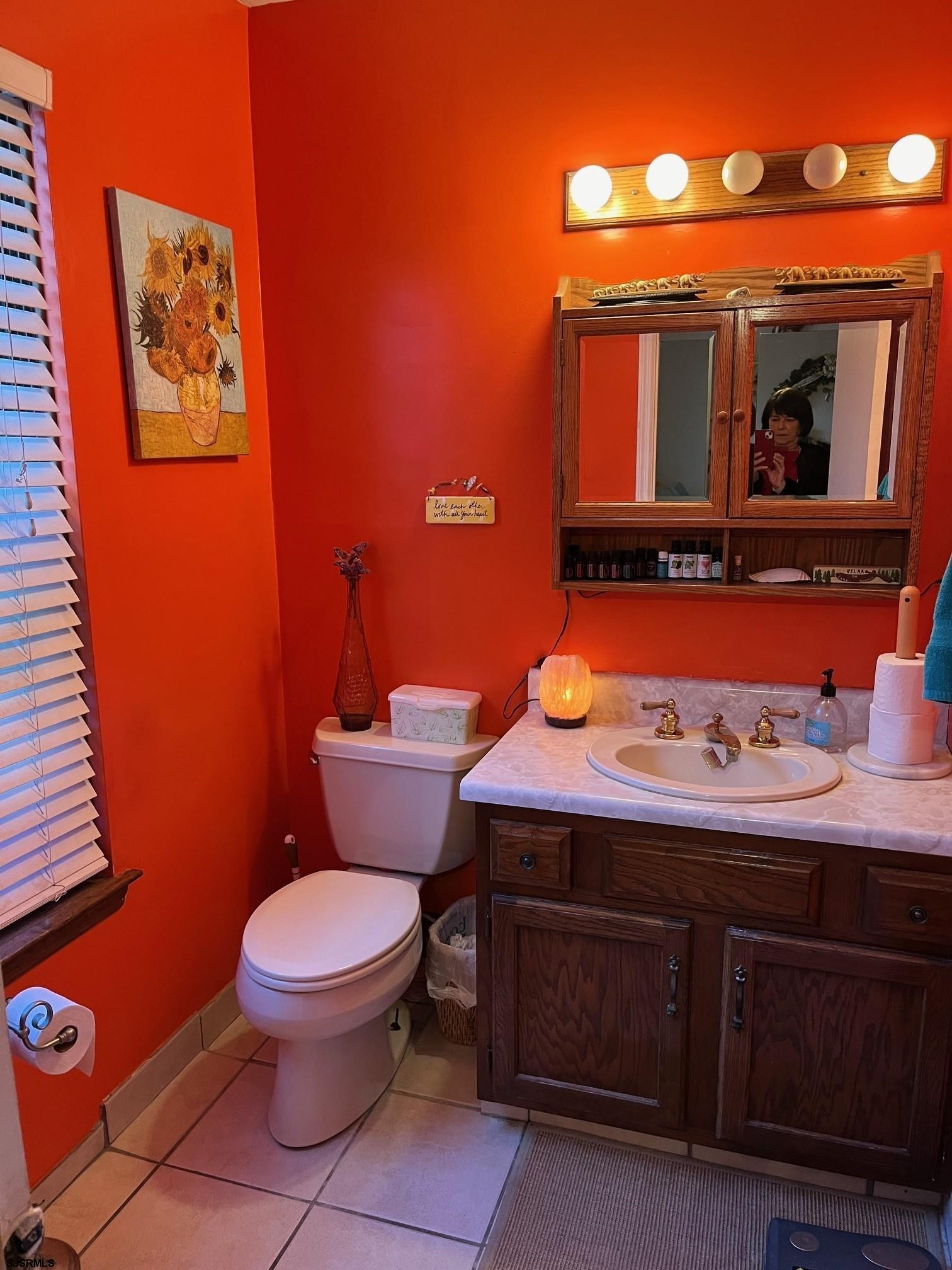 15 East Sunrise Road Woodbine, NJ 08270 - Photo 14 of 23 a bathroom with a toilet a sink and mirror