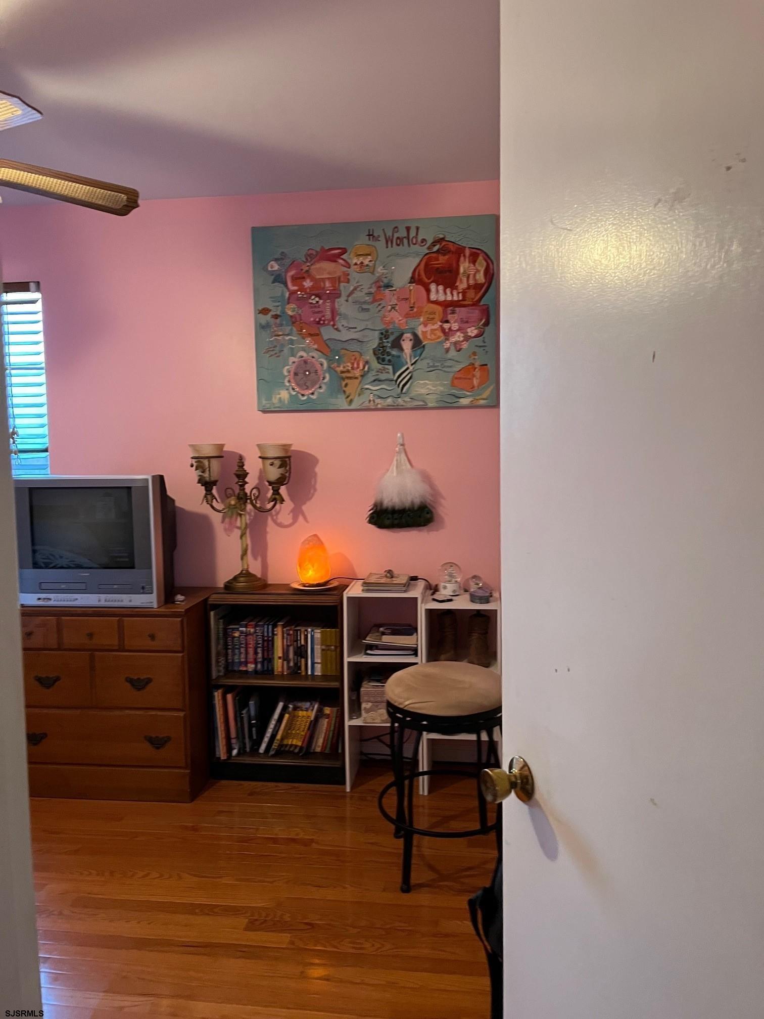 15 East Sunrise Road Woodbine, NJ 08270 - Photo 15 of 23 a living room with furniture and a flat screen tv