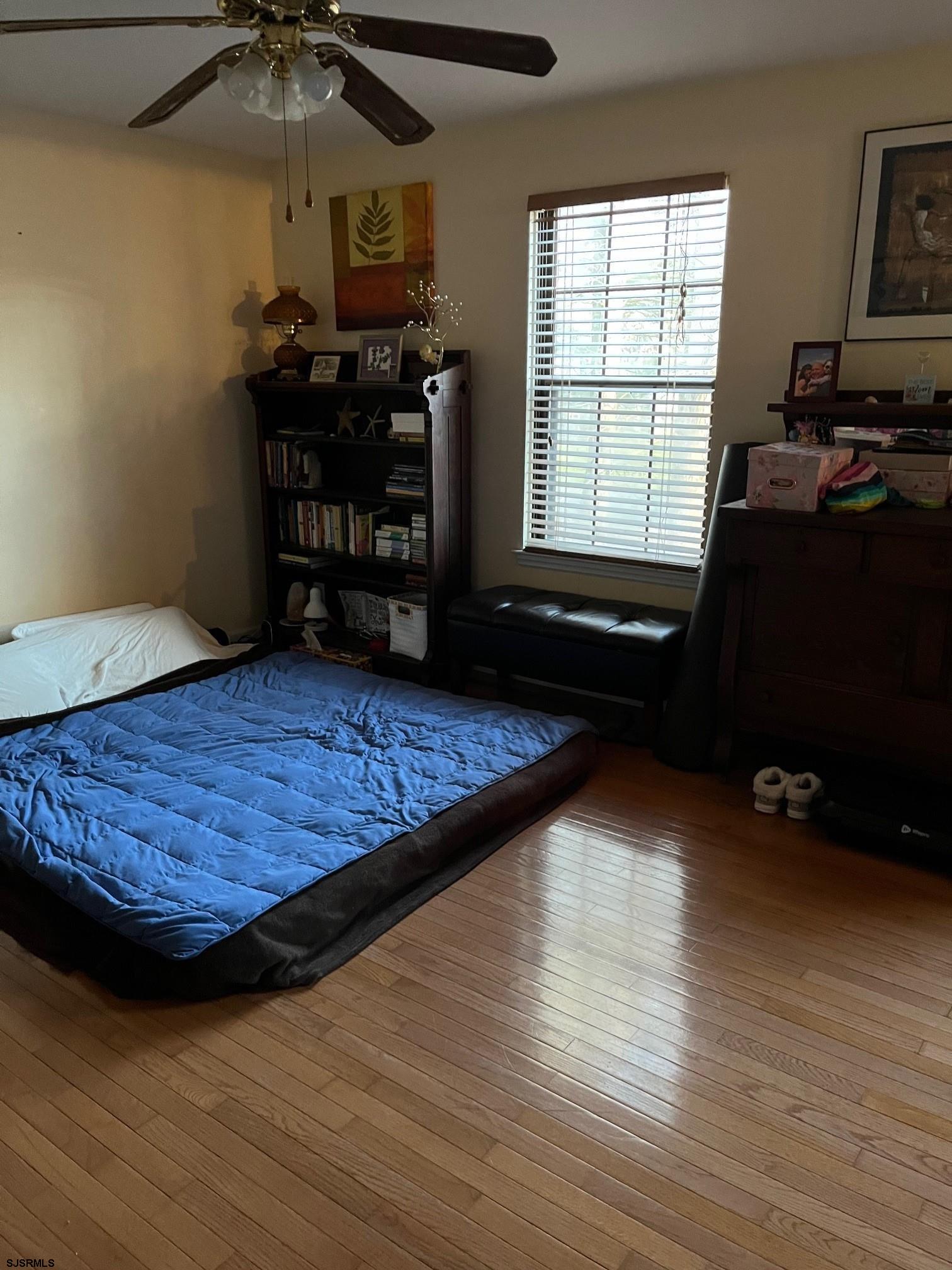 15 East Sunrise Road Woodbine, NJ 08270 - Photo 16 of 23 a living room with furniture and a wooden floor