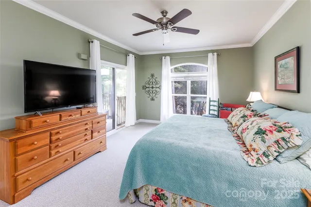 a bedroom with a bed and dresser