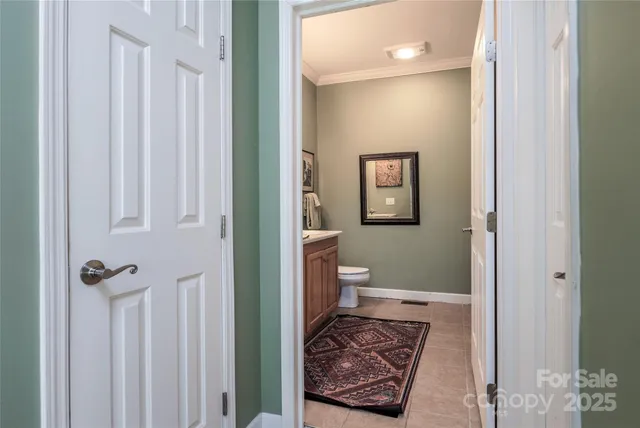 a en suite bathroom with a sink and a mirror