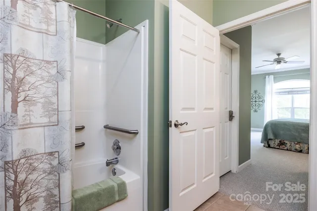 a kitchen with stainless steel appliances granite countertop a sink a stove and a microwave