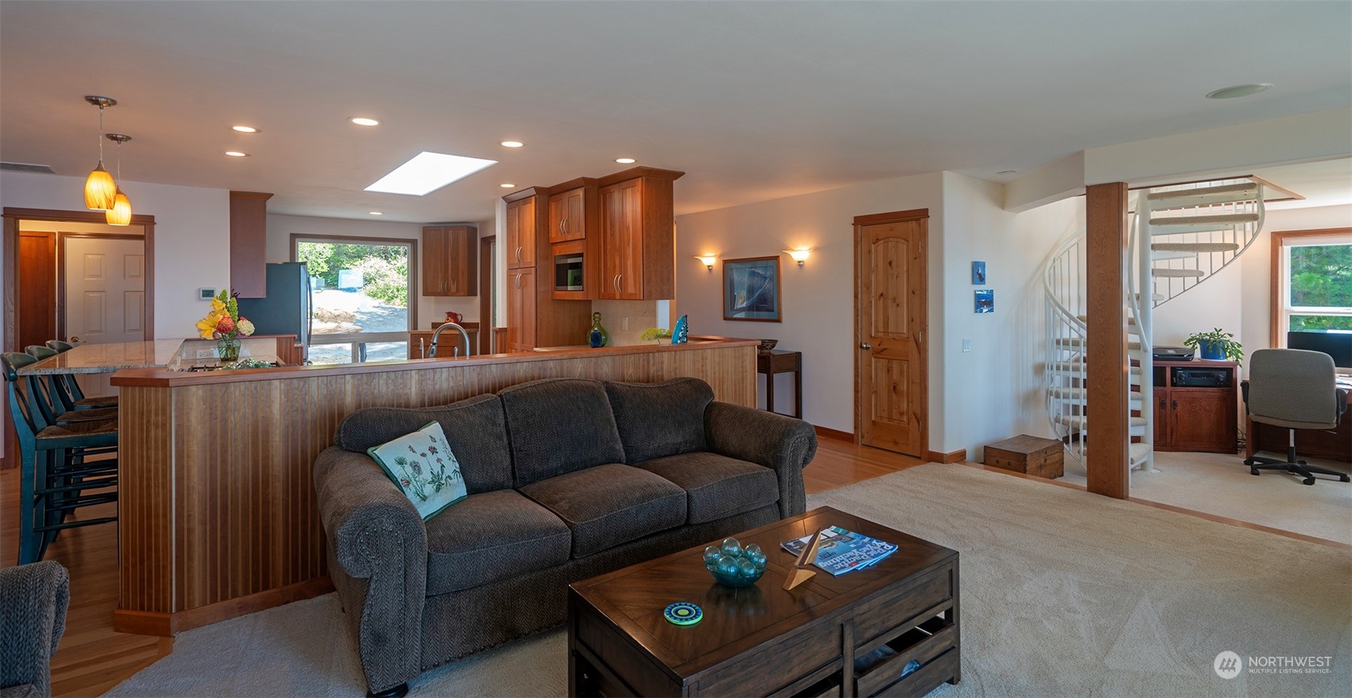 1313 Lopez Road Lopez Island, WA 98261 - Photo 12 of 31 a living room with furniture and a flat screen tv