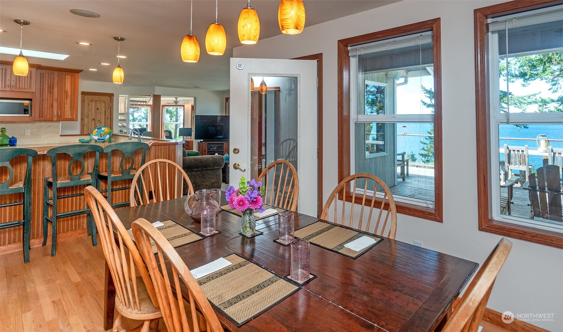1313 Lopez Road Lopez Island, WA 98261 - Photo 16 of 31 a dining room with furniture and wooden floor