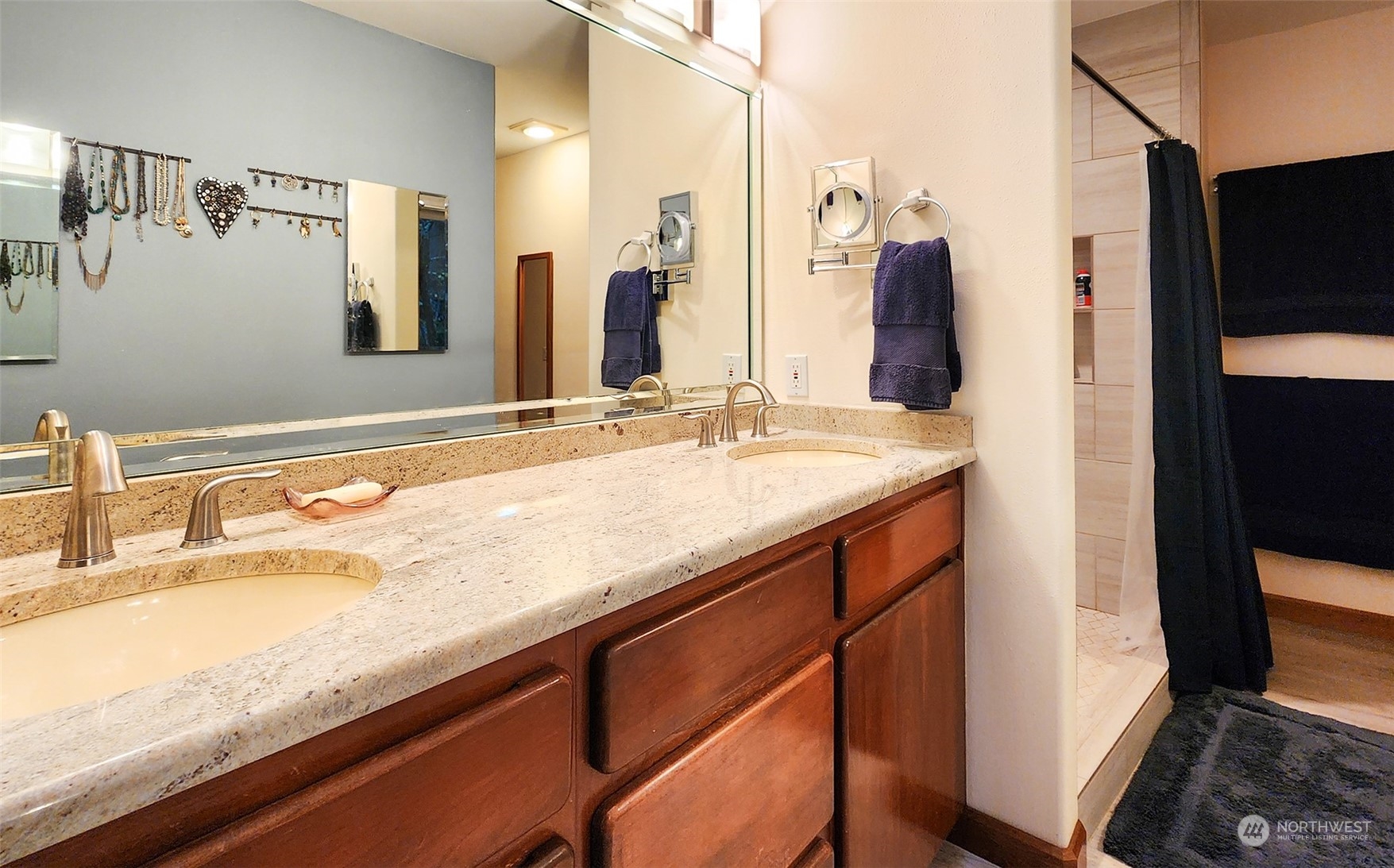 1313 Lopez Road Lopez Island, WA 98261 - Photo 21 of 31 a bathroom with a granite countertop sink and a mirror