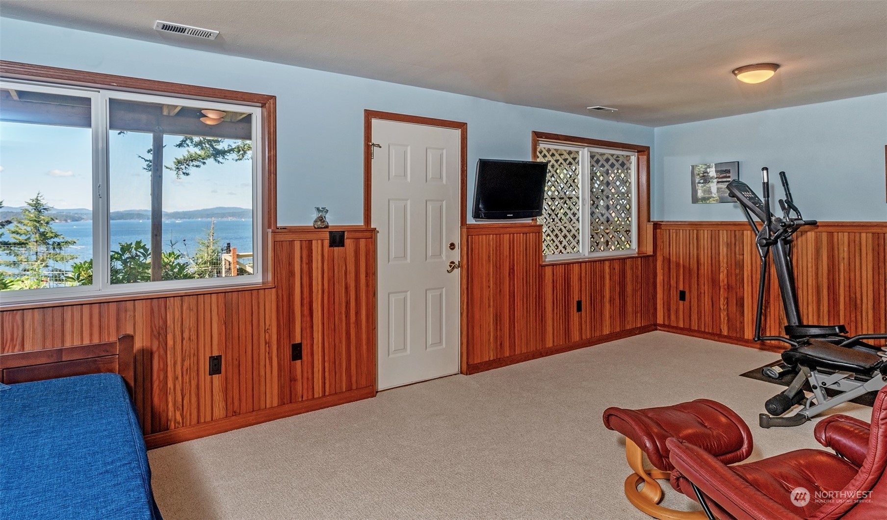 1313 Lopez Road Lopez Island, WA 98261 - Photo 26 of 31 a view of a room with furniture window and a wooden floor