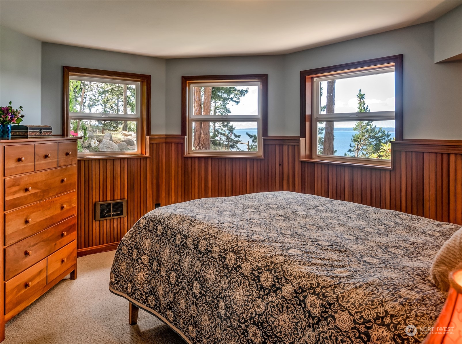 1313 Lopez Road Lopez Island, WA 98261 - Photo 27 of 31 a bed sitting in a bedroom next to a window