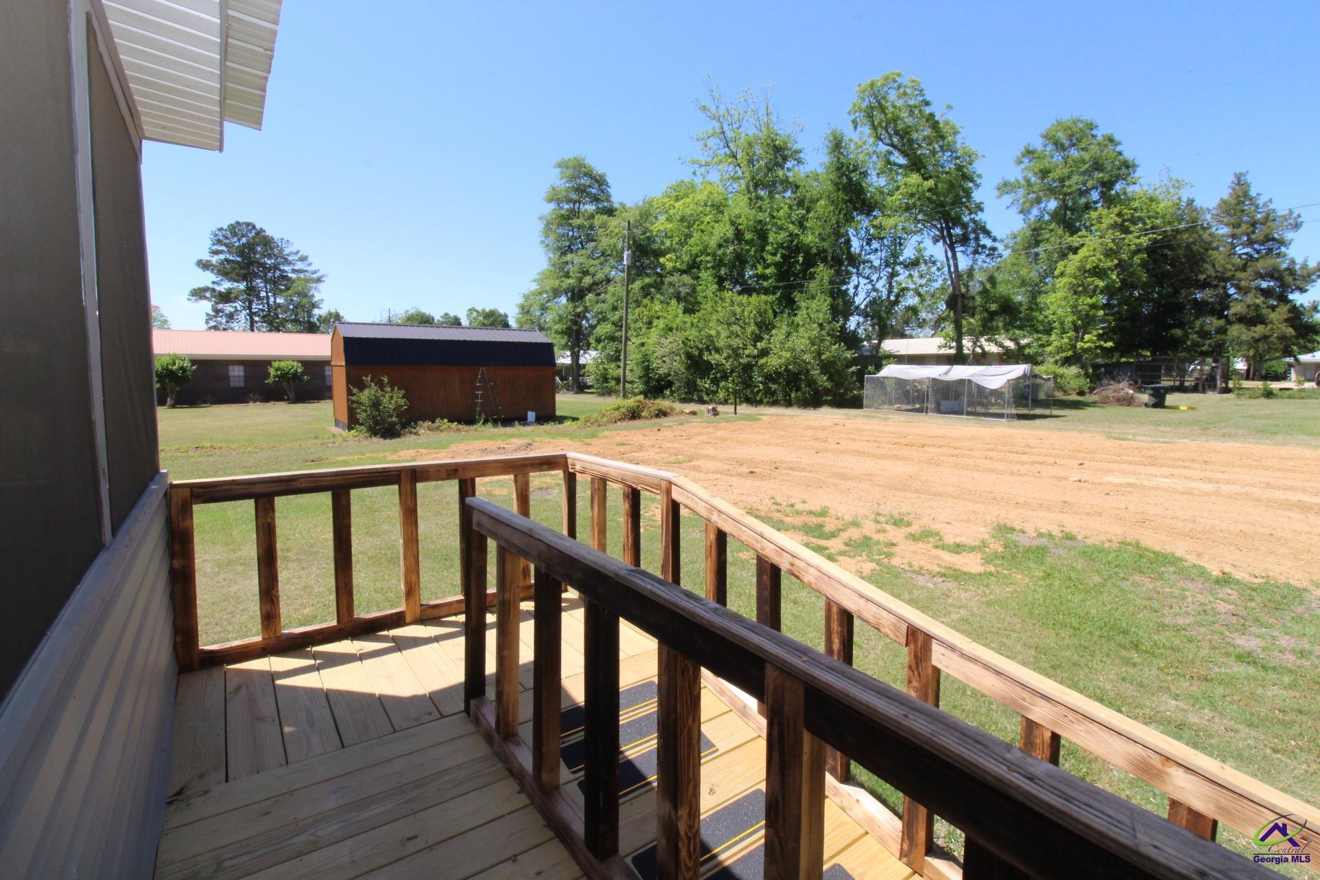 218 6th Avenue Rochelle, GA 31079 - Photo 20 of 22 a view of a balcony with an ocean view