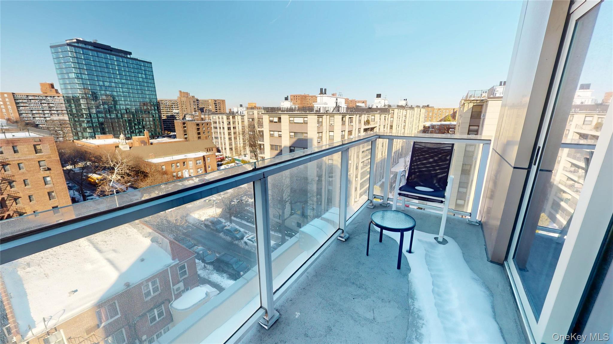 97-29 64th Road Queens, NY 11374 - Photo 11 of 11 a view of a balcony with chairs