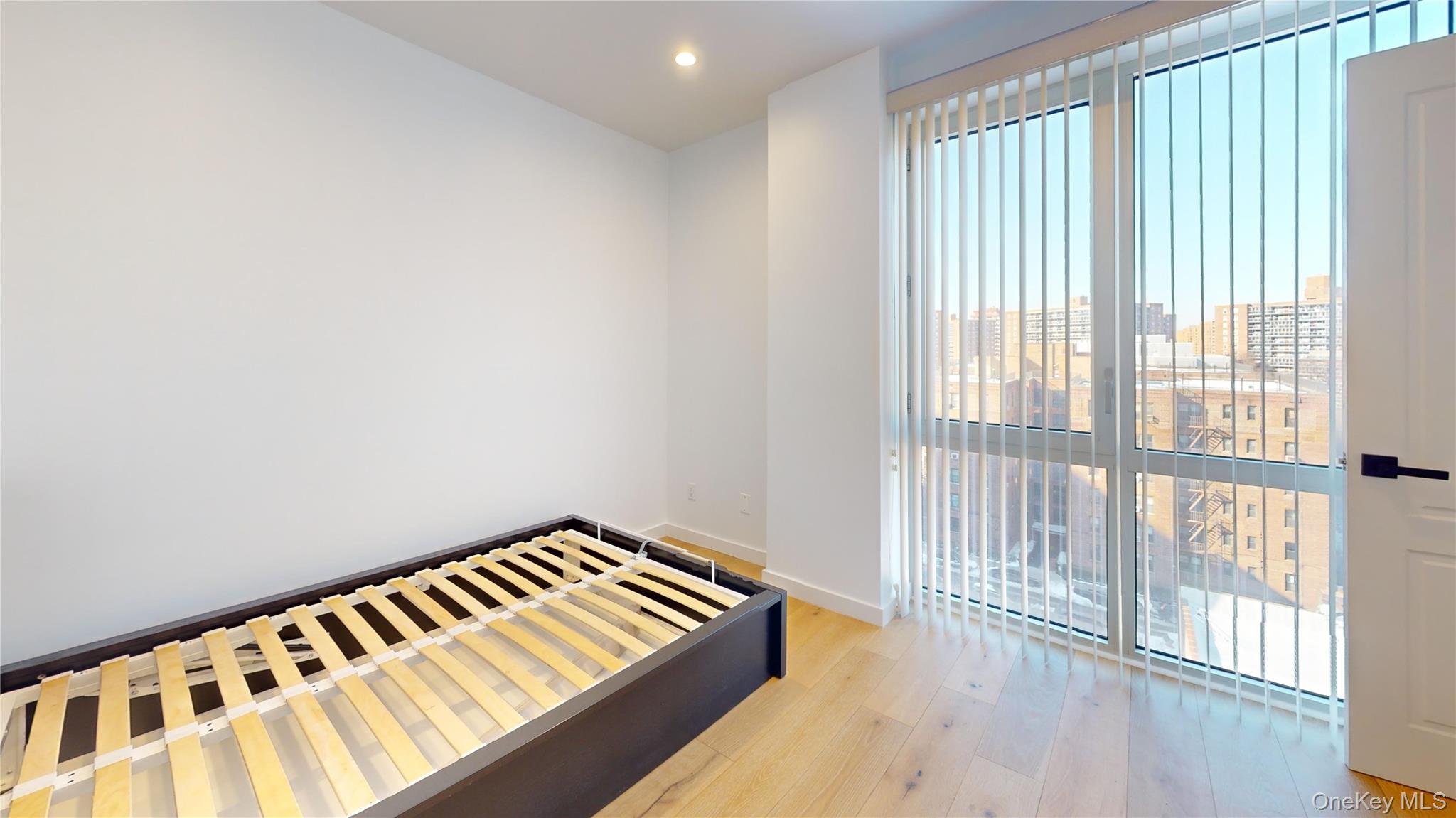 97-29 64th Road Queens, NY 11374 - Photo 7 of 11 a view of a room with wooden floor