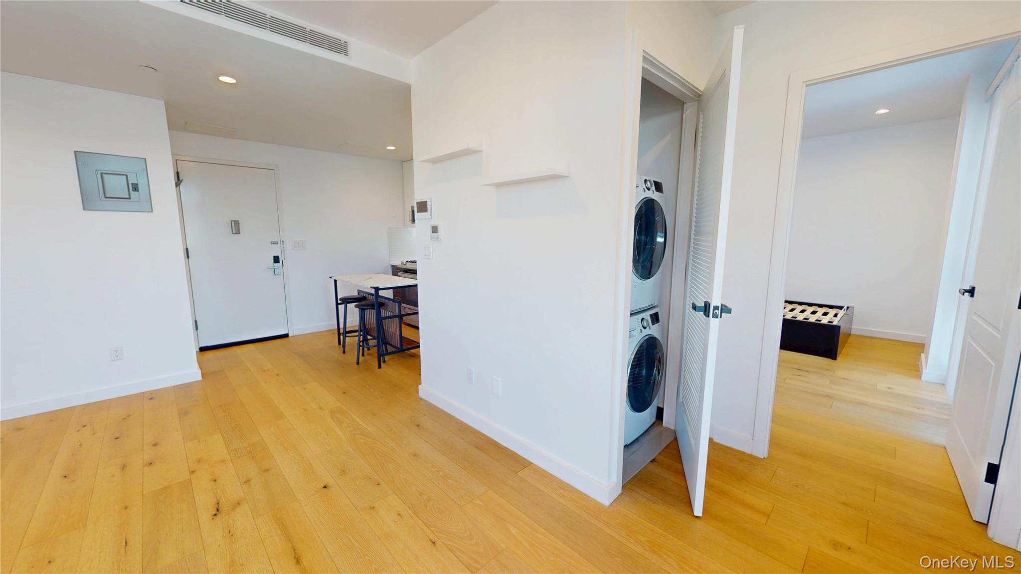 97-29 64th Road Queens, NY 11374 - Photo 9 of 11 a view of a room with gym equipment