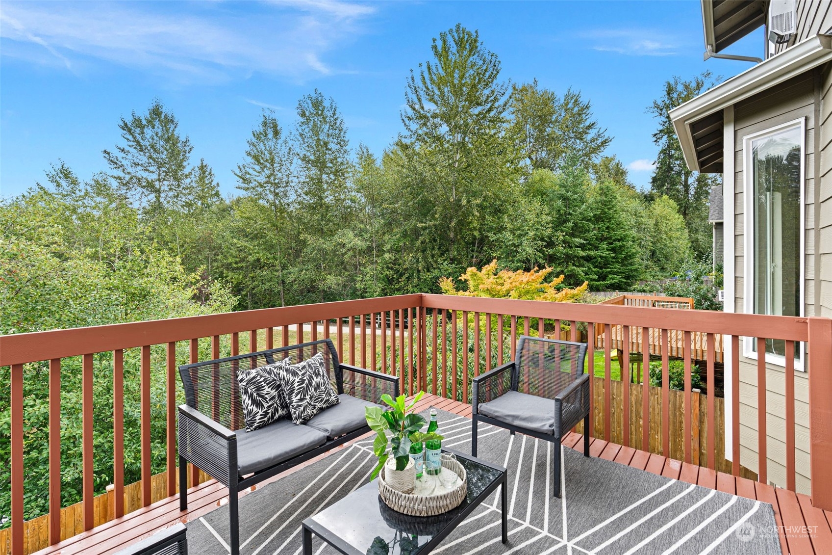 906 Jericho Place Northeast Renton, WA 98059 - Photo 15 of 39 a view of a two chairs in the deck