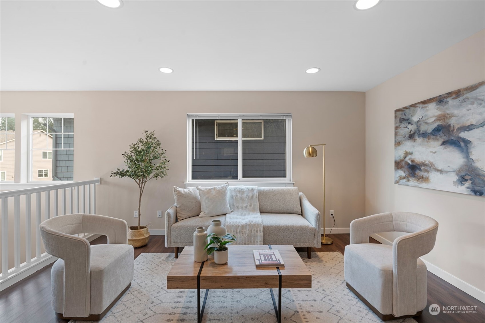 906 Jericho Place Northeast Renton, WA 98059 - Photo 26 of 39 a living room with furniture and a large window
