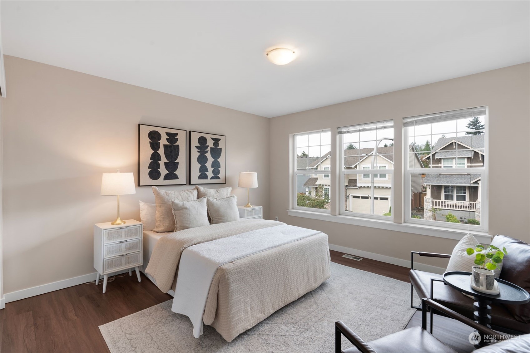 906 Jericho Place Northeast Renton, WA 98059 - Photo 30 of 39 a bedroom with a bed and a large window
