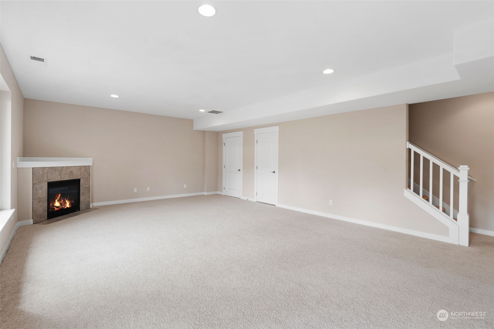 906 Jericho Place Northeast Renton, WA 98059 - Photo 32 of 39 a view of an empty room with a fireplace