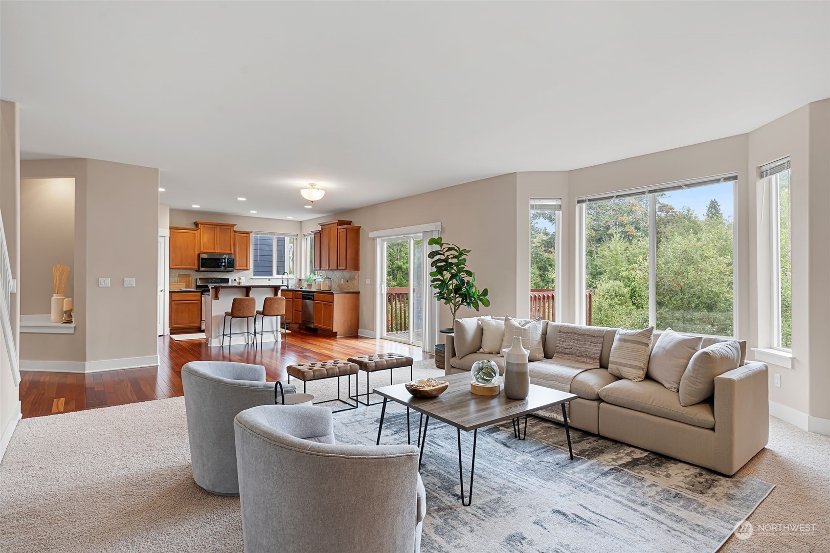 906 Jericho Place Northeast Renton, WA 98059 - Photo 10 of 39 a living room with furniture and a large window