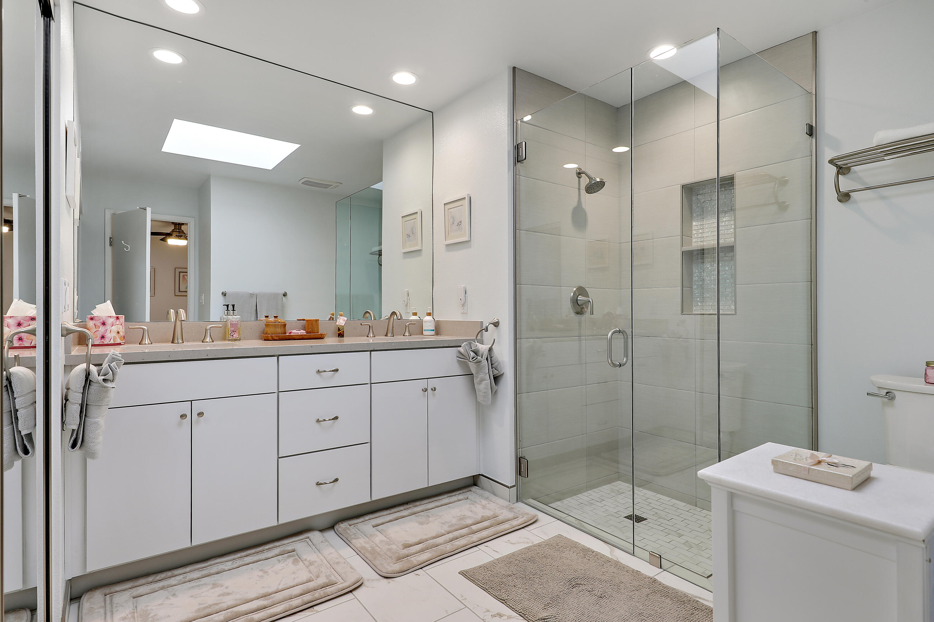 159 Torremolinos Drive Rancho Mirage, CA 92270 - Photo 11 of 17 a spacious bathroom with double sink and shower
